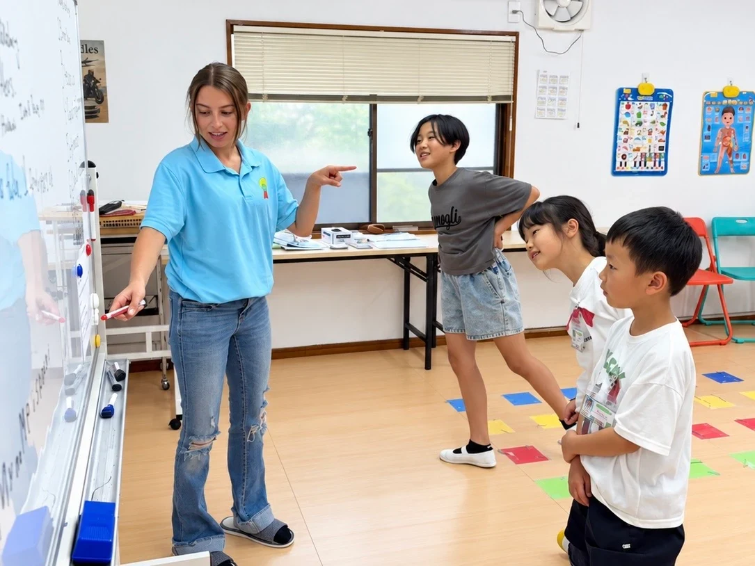 Children communicating with teachers and friends in English at SELS in Fuji City.